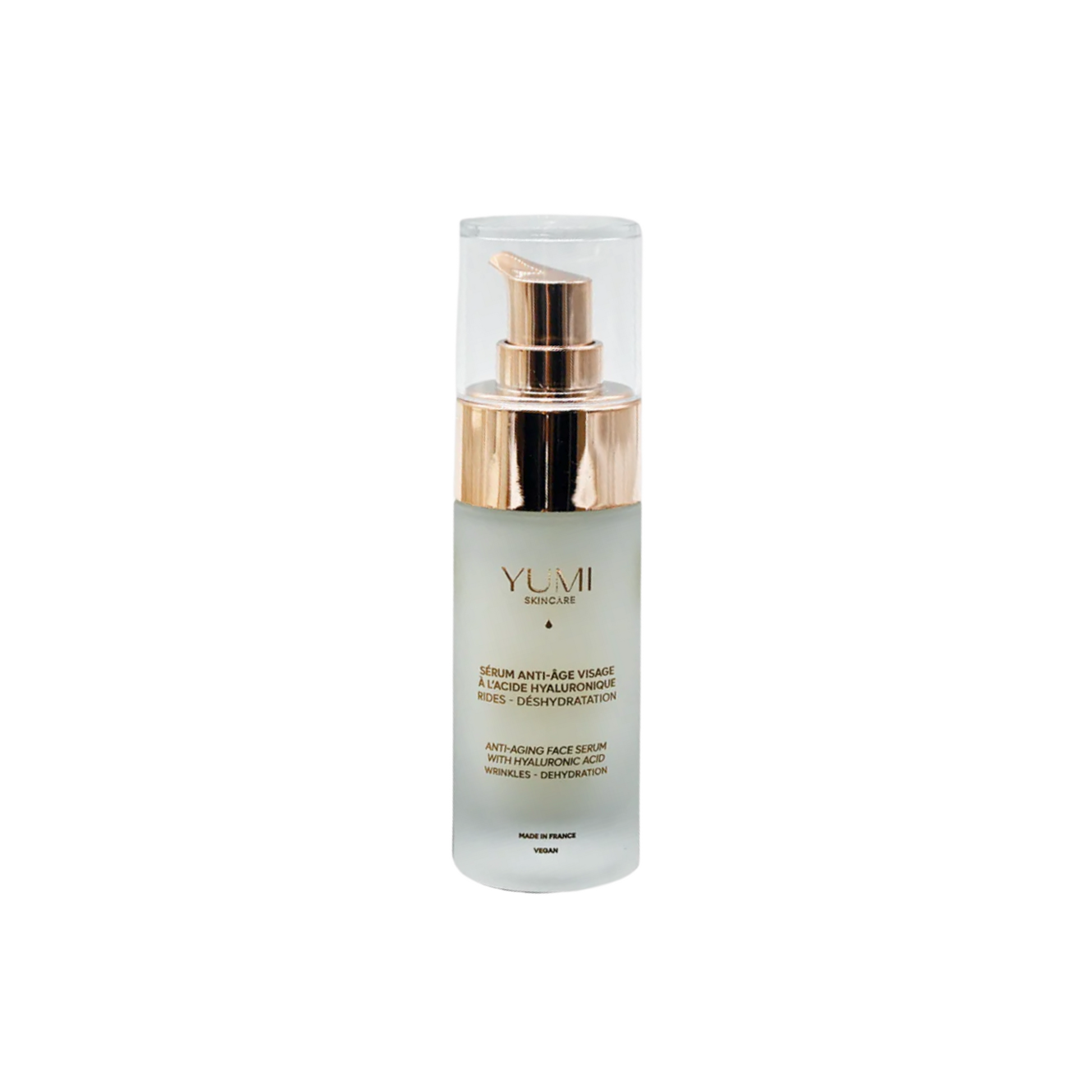 YUMI skincare serum bottle with rose gold cap on a white background