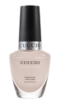Cuccio Colour Pier Pressure nail polish bottle from Cuccio Colour line with vibrant pink shade, displayed against a plain background.