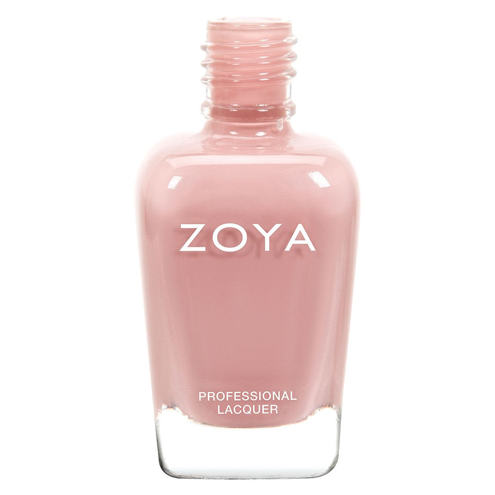 Zoya Mia nail polish bottle with vibrant pink color, showcasing the Zoya brand and a sleek, modern design.