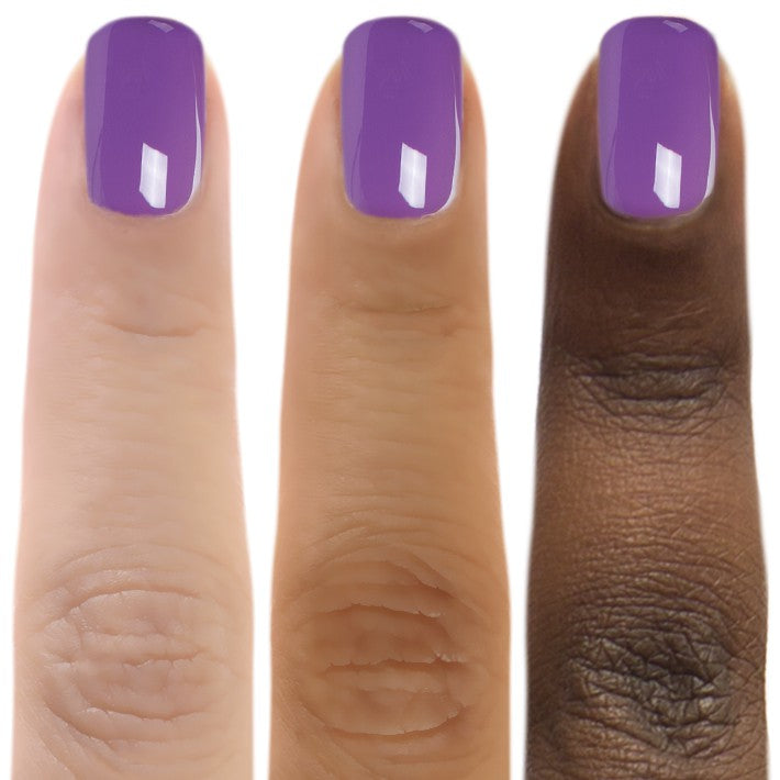 Zoya Tina nail polish bottle with vibrant pink color, showcasing the Zoya brand and sleek glass packaging.