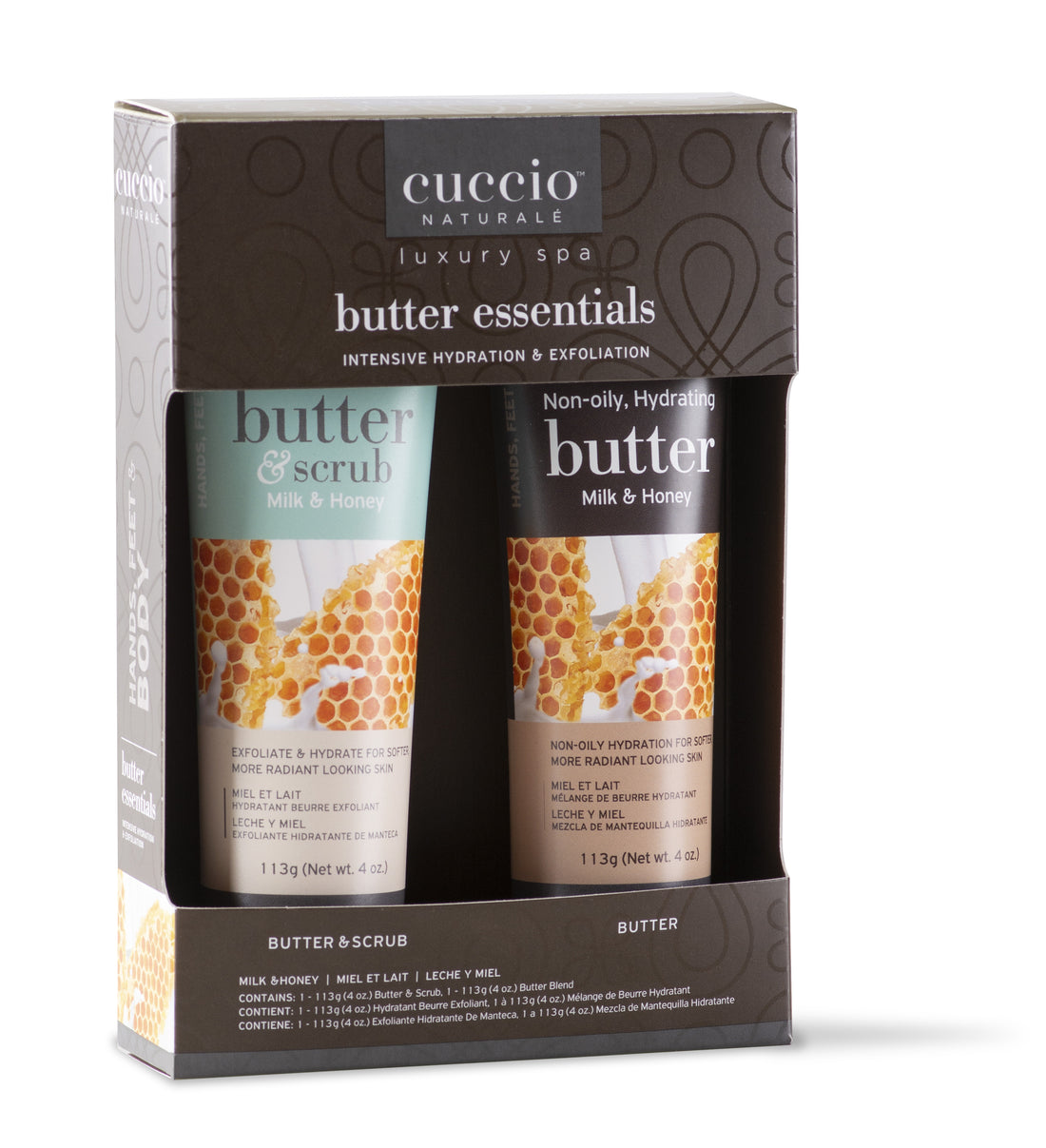 A Cuccio Naturale Butter Essentials gift box containing two tubes of butter & scrub and butter products, with a honey & milk butter description, set against a white background.