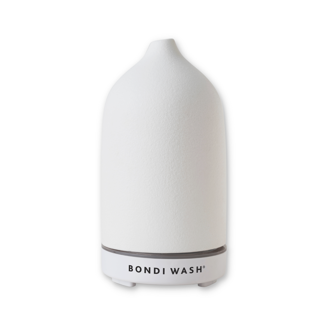 Bondi Wash aromatherapy diffuser emitting a gentle mist, with a sleek design and natural vapor in a modern home setting.
