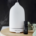 Bondi Wash aromatherapy diffuser with sleek design, emitting a gentle mist for relaxing essential oil scents.