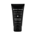 Bondi Wash hand cream in a sleek tube, moisturizing hands with a nourishing hand moisturizer from Bondi Wash.