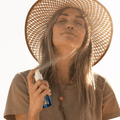 Coola Classic Face Organic Sunscreen Mist SPF50 bottle with spray nozzle, suitable for face sun protection.