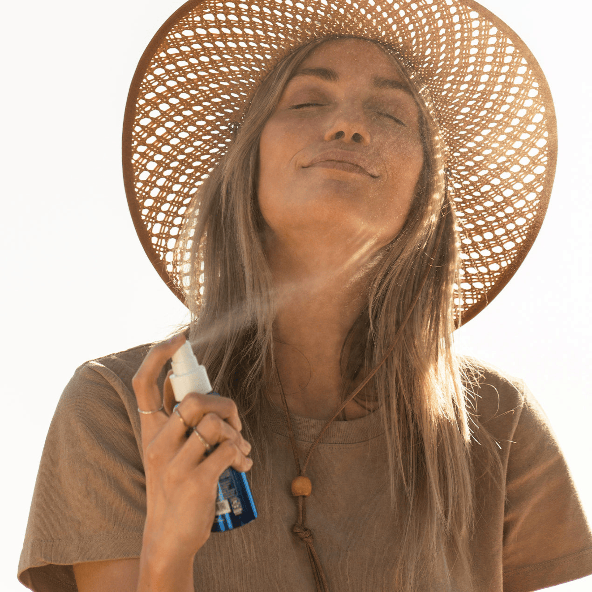 Coola Classic Face Organic Sunscreen Mist SPF50 bottle with spray nozzle, suitable for face sun protection.