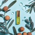 Coola Classic Liplux organic hydrating lip oil with SPF 30, featuring a sleek tube and clear labeling.