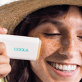 Coola Classic Organic Sunscreen Stick SPF30 with tropical coconut scent, featuring a white portable sunscreen stick.