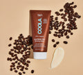 Coola Organic Sunless Tan Firming Lotion in a sleek bottle, a self-tanner by Coola Suncare, showing the product label and packaging.
