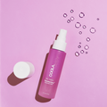 Coola Reawakening Rosewater Mist face spray by Coola Suncare, featuring a refreshing skincare mist in a clear spray bottle.