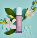 Coola Sun Silk Drops Organic Face Sunscreen SPF30 serum bottle with dropper applicator for facial sun protection.