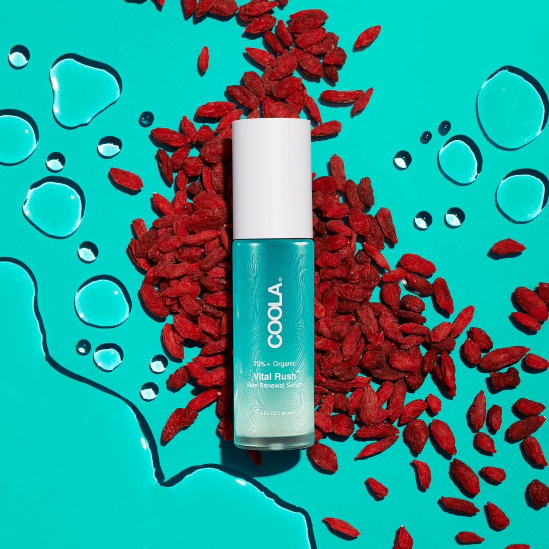 Coola Vital Rush Skin Renewal Serum in a glass bottle with a dropper, part of Coola Suncare's skincare line.