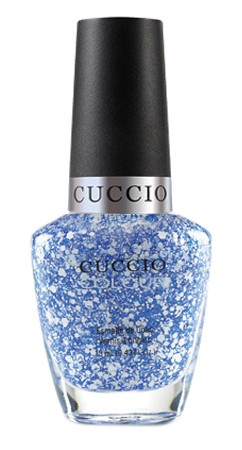 Cuccio Colour All The Rave nail polish bottle featuring vibrant, multicolored nail polish on a white background.