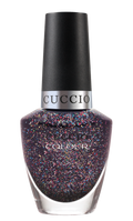 Cuccio Colour Big Bang Theory nail polish bottle with vibrant purple shade, showcasing the Cuccio Colour brand.
