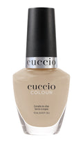 Cuccio Colour Bite Your Lip nail polish bottle from Cuccio Colour brand with vibrant pink shade and glossy finish.