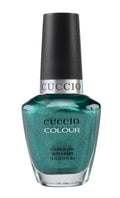 Cuccio Colour Dublin Emerald Isle nail polish bottle displaying vibrant emerald green shade on a white background.