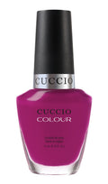 Cuccio Colour Eye Candy Miami nail polish bottle in vibrant pink and purple shades, displayed on a white background.