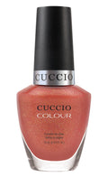 Cuccio Colour Giselle's Beauty nail polish bottle with vibrant pink shade, showcasing the Cuccio Colour branding.