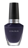 Cuccio Colour London Underground nail polish bottle with colorful label, showcasing vibrant nail polish color.