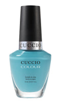 Cuccio Colour Make a Wish in Rome nail polish bottle with colorful packaging, showcasing a vibrant nail polish product.