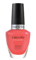 Cuccio Colour Paradise Found nail polish bottle from Cuccio Colour, showcasing vibrant pink shade and sleek packaging.