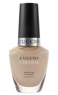 Cuccio Colour Prima Ballerina's Blush nail polish bottle from Cuccio Colour, showcasing soft pink shade and sleek packaging.