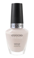 Cuccio Colour Take Heart in Turin nail polish bottle with pink and purple shades, displayed on a neutral background.