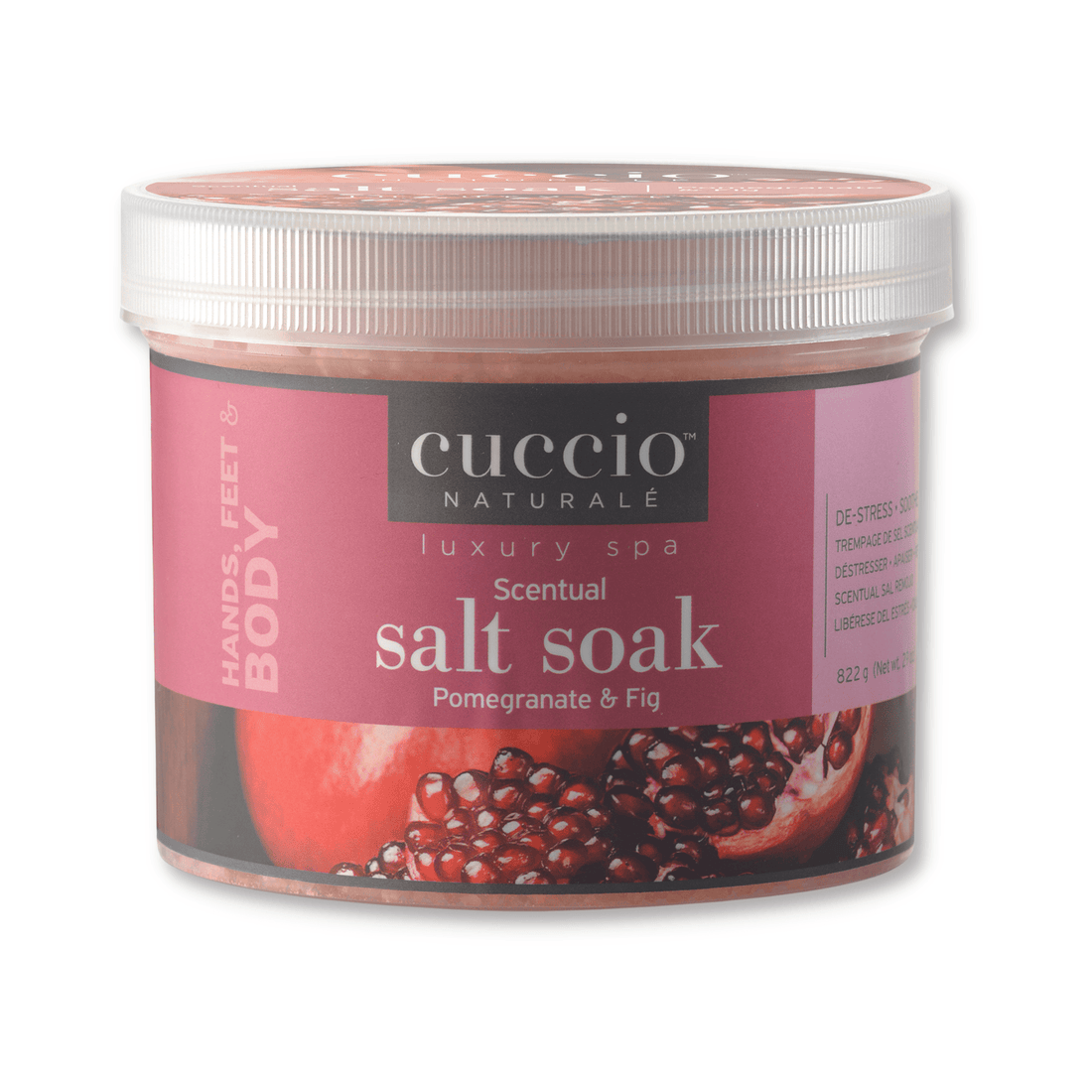 Cuccio Naturalé Scentual Salt Soak in Pomegranate & Fig, showcasing a jar of aromatic bath salts with fresh fruit and botanical ingredients.