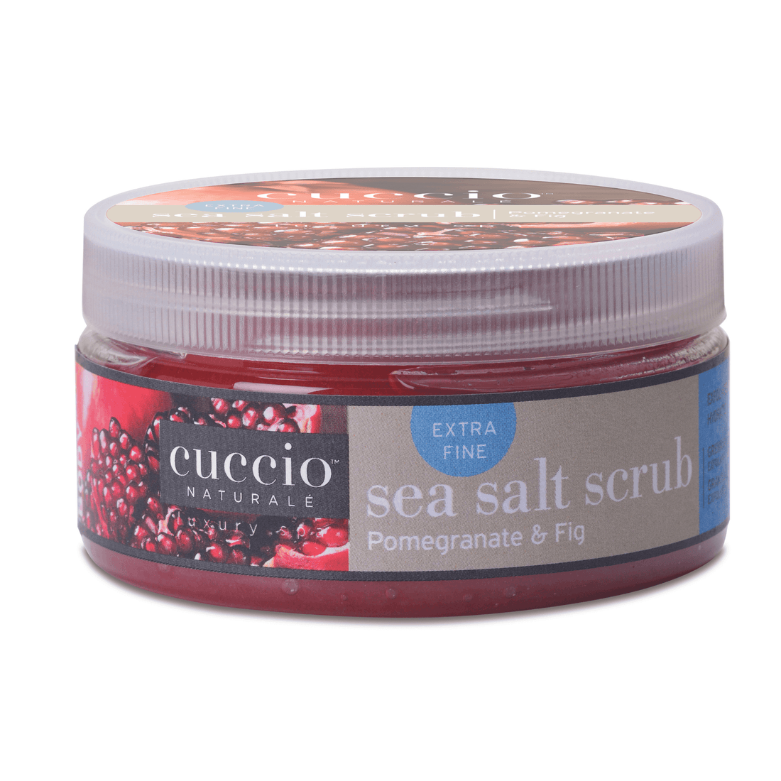Cuccio Naturalé Sea Salt Body Scrub with pomegranate and fig, featuring textured salt and natural ingredients for exfoliation.