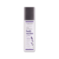 Cuccio Naturalé Skin Prebiotic Body Serum with lavender oil, featuring a clear bottle with a pump dispenser and lavender accents.
