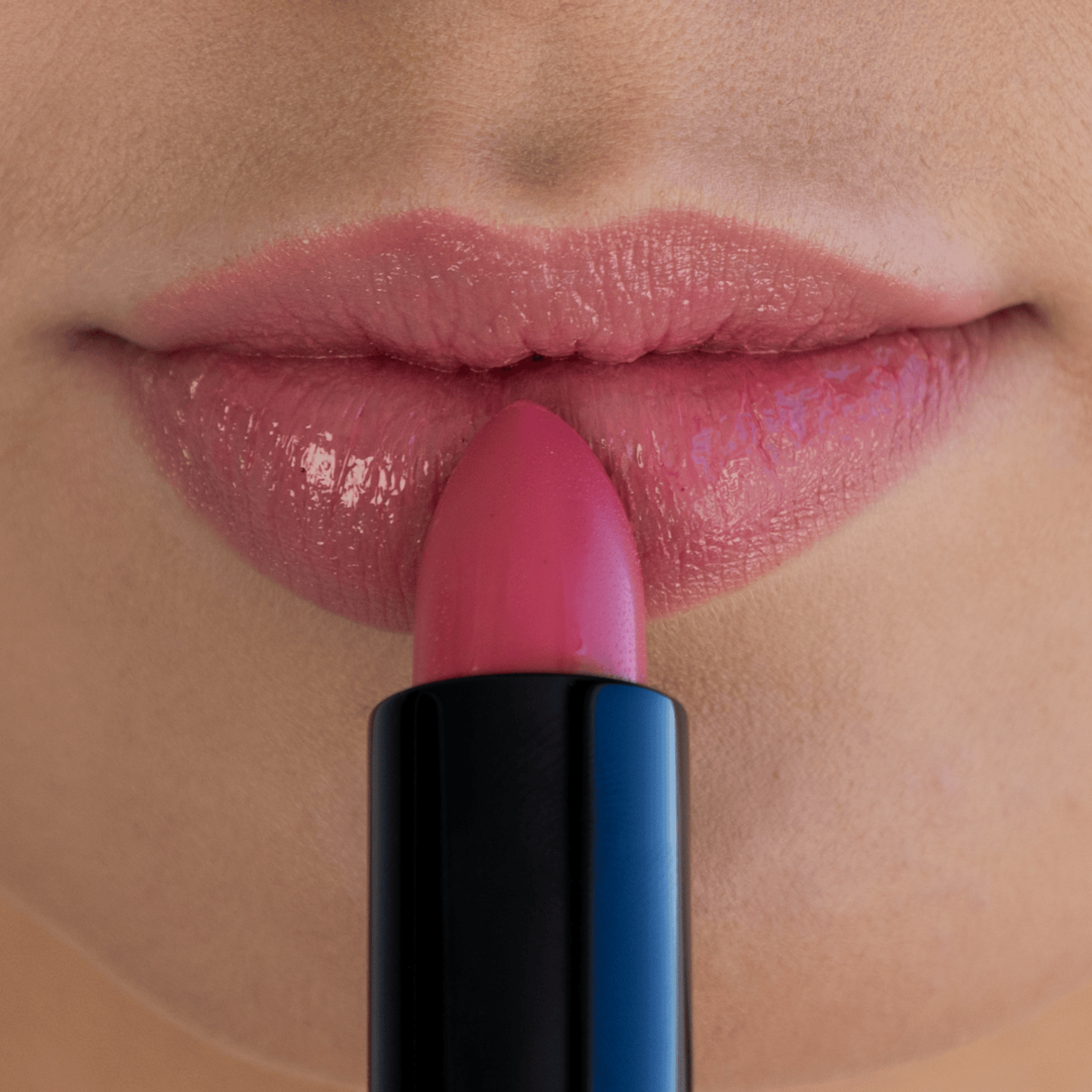 Eco by Sonya Driver Kirra Pink lipstick in a sleek makeup tube with a vibrant pink shade and silver cap.
