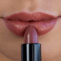 Eco by Sonya Driver Miami Rose lipstick in a sleek makeup tube, showcasing a vibrant pink shade.