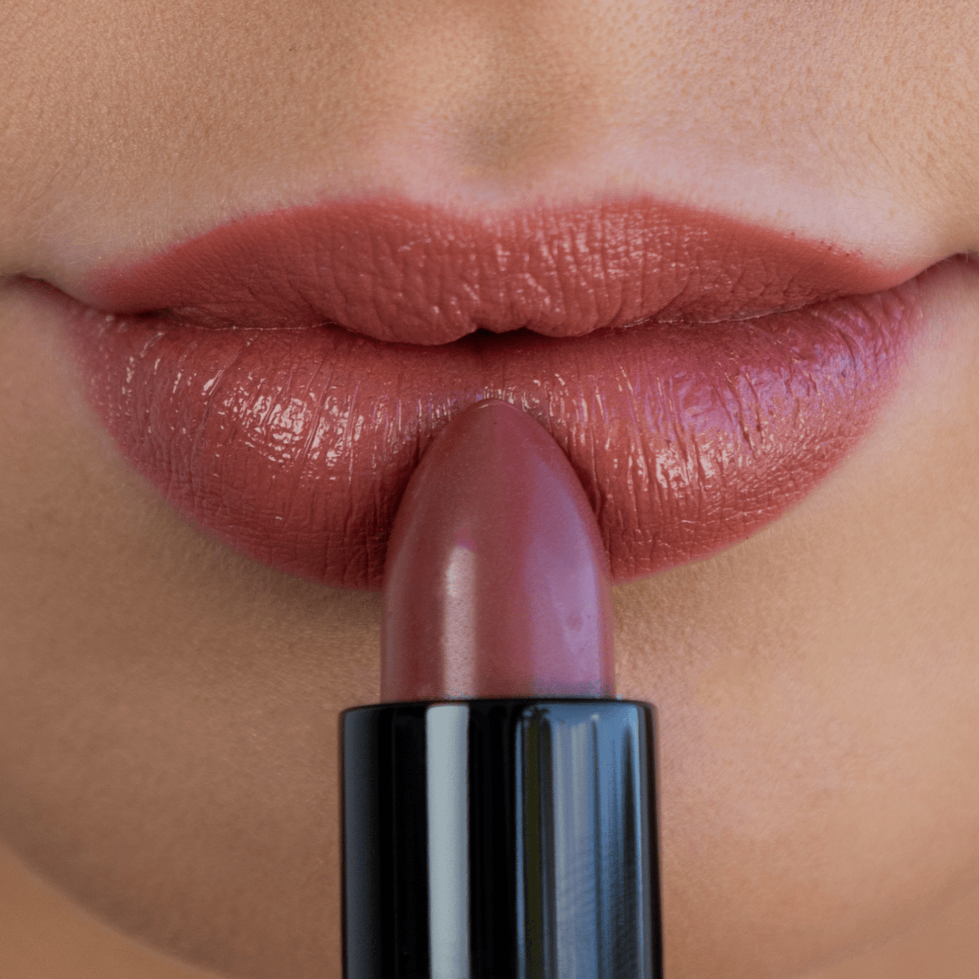 Eco by Sonya Driver Miami Rose lipstick in a sleek makeup tube, showcasing a vibrant pink shade.