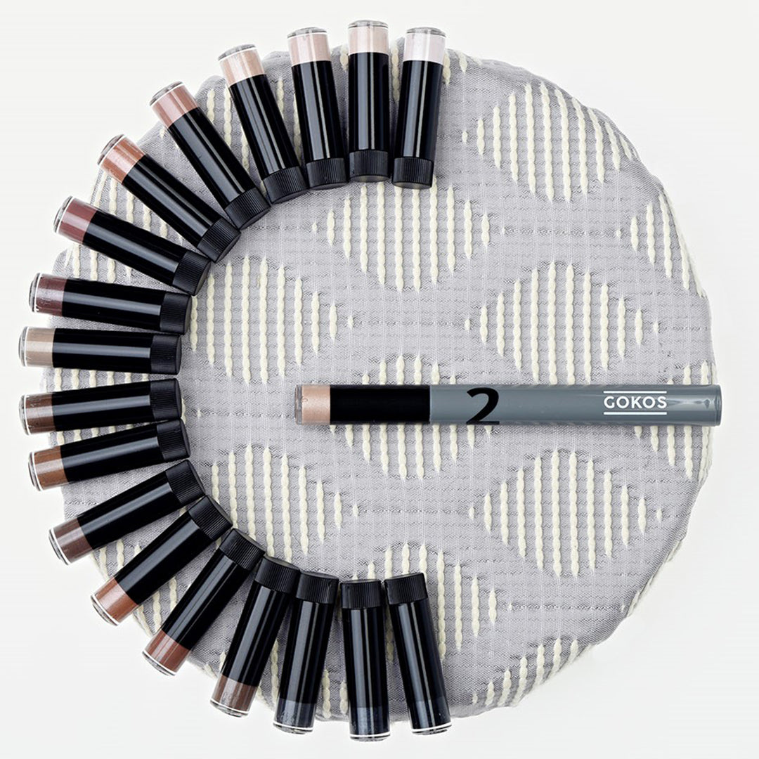 Gokos Refill Eyecolor makeup palette with vibrant eyeshadow shades in sleek compact, ready for easy application.