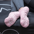 Yumi Feet SPA Socks for foot treatments, soft fabric with soothing gel lining, designed to hydrate and relax tired feet.