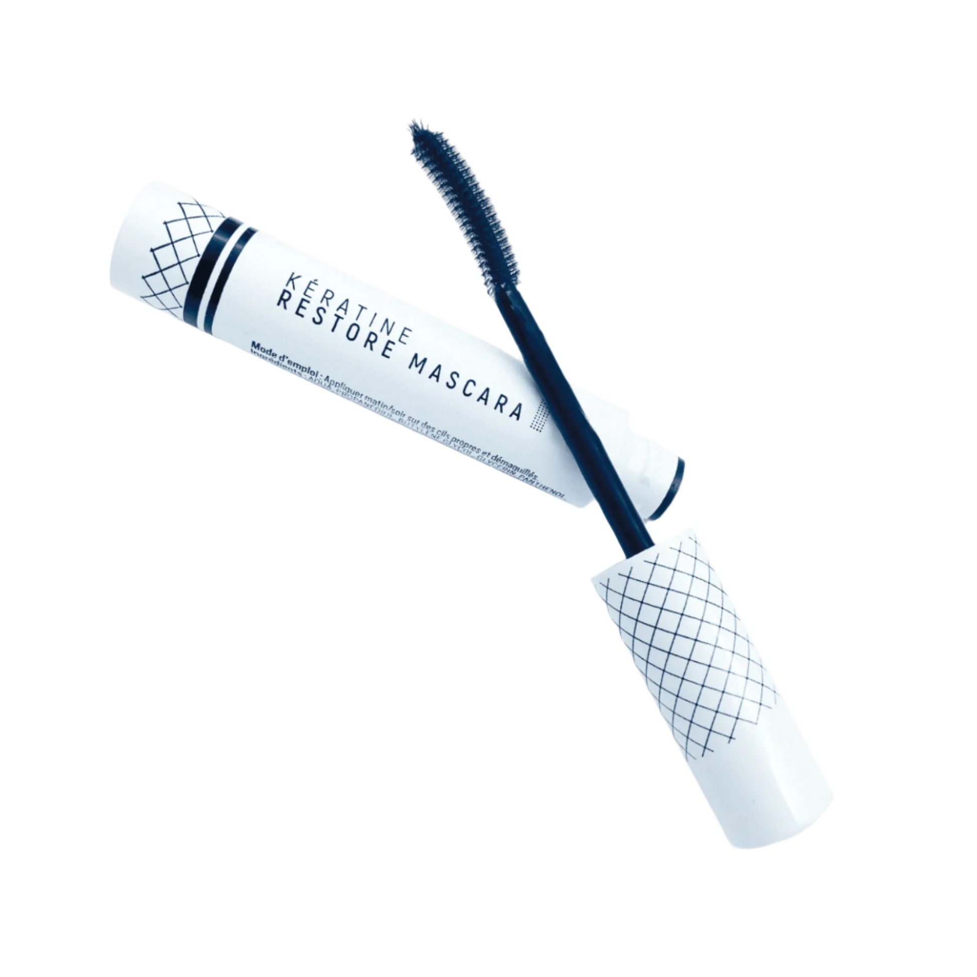 Yumi Lashes Keratine Restore Mascara brush applicator with black mascara on lashes, part of Yumi Lashes' lashes and brows collection.