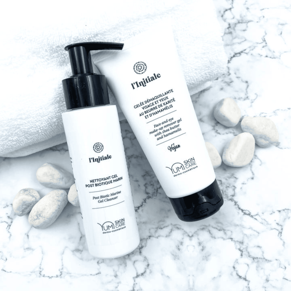 Yumi Skincare facial and eye makeup remover gel in a clear tube, designed to gently cleanse and remove makeup from face and eyes.