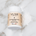 Yumi Skincare Sensicare Facial Cleansing Powder in a white container, designed for gentle skin cleansing and exfoliation.