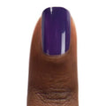 Zoya Chiara nail polish bottle with a sleek design, showcasing vibrant, glossy nail color in a professional studio setting.