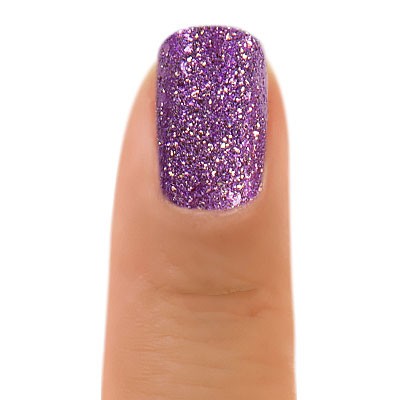 Zoya Cookie nail polish bottle featuring a warm, caramel-bink shade of Zoya nail polishes on a plain background.