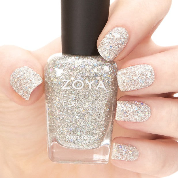 Zoya Cosmo nail polish bottle showing vibrant, shimmering purple shade with the Zoya logo on the label.