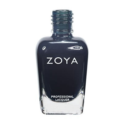 Close-up of Zoya Cynthia nail polish bottle with vibrant pastel purple polish in a clear glass bottle with a black cap.