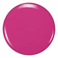 Close-up of Zoya Dacey nail polish bottle with vibrant pink nail polish swatch on a hand.