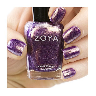 Close-up of Zoya Daul nail polish bottle with vibrant purple shade and smooth finish.