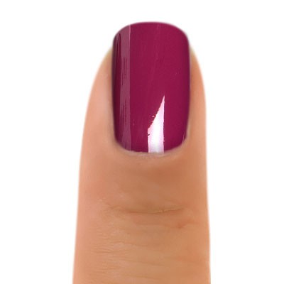 Zoya Donnie nail polish bottle with vibrant teal color and sleek design, showcasing the Zoya brand on the label.