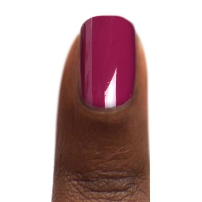 Zoya Donnie nail polish bottle showcasing the vibrant, glossy pink shade from the Zoya nail polish collection.