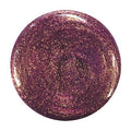 Close-up of Zoya Faye nail polish bottle with the polish applied on neatly manicured nails.