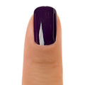 Zoya Gabi nail polish bottle showing vibrant, deep red color and sleek Zoya branding on the label.