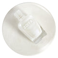 Zoya Genesis nail polishes collection featuring a variety of vibrant and pastel shades in sleek bottles.