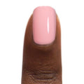 Close-up of Zoya Joey nail polish bottle showing vibrant pink color and sleek design.
